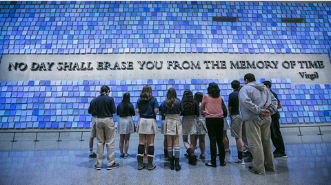 people at 9/11 memorial