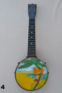 banjo with drawing of beach