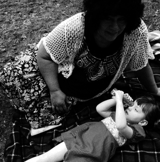 black and white photo of woman with child